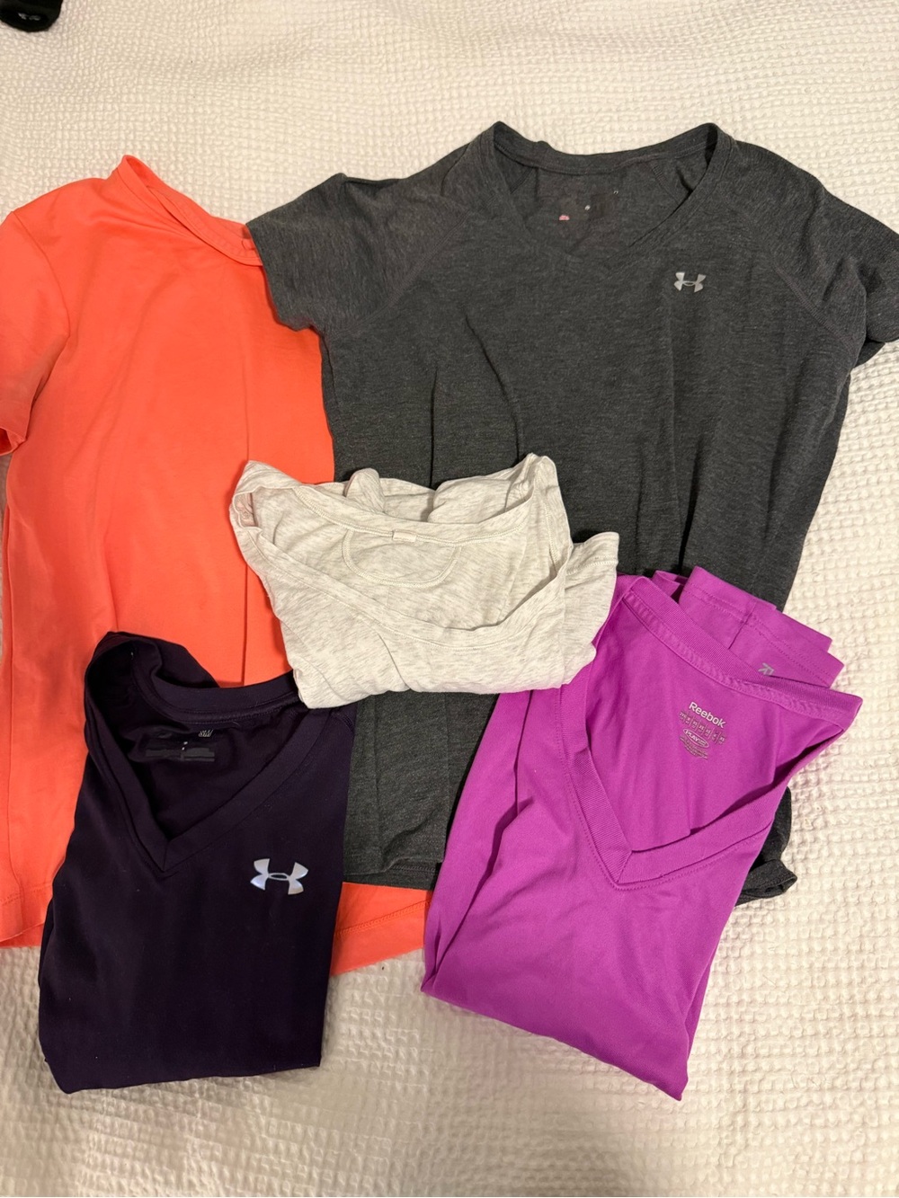 Bundle of five athletic shirts